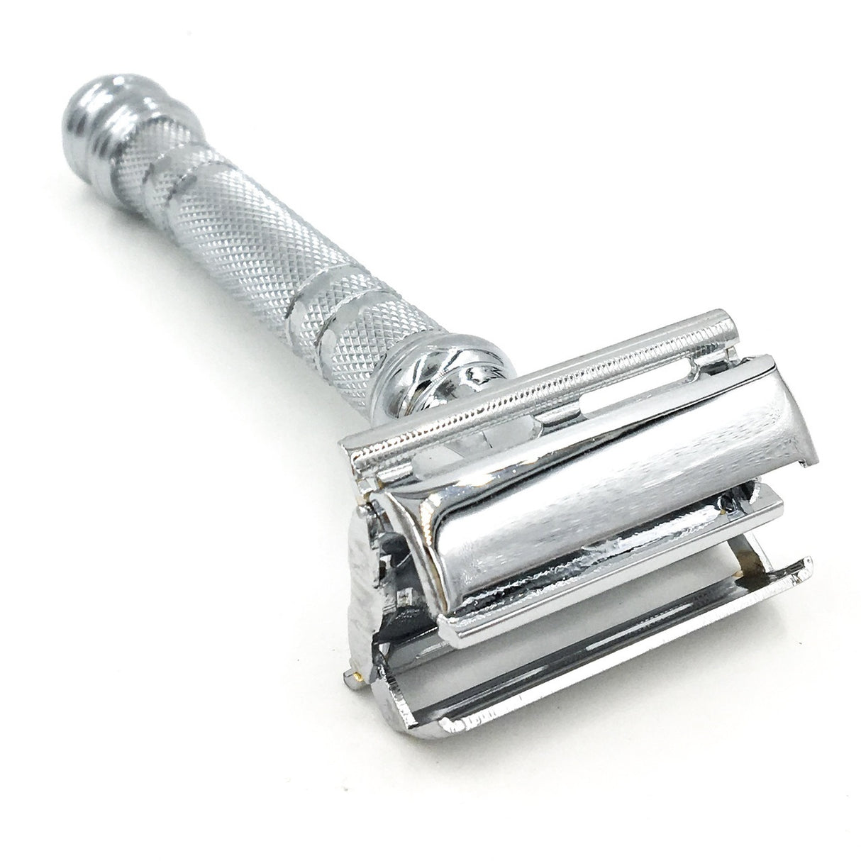 Introduced in 2016, the Parker 66R is a heavyweight safety razor with the world famous Parker twist-to-open head for a close, comfortable shave. Twisting the knob on the bottom of the razor will open the butterfly doors for blade insertion. This beautifully designed chrome plated all brass razor is a smooth shaver. Parker Safety Razor has been making the highest quality, precision engineered safety razors for over 45 years.