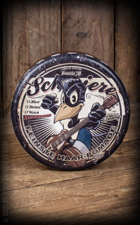 Rumble 59 is a lifestyle brand based on the rockabilly culture and styles worn by the "greaser" street gangs. Rumble 59 Schmiere oil based pomades and water based pomades come in a variety of holds and fragrances.