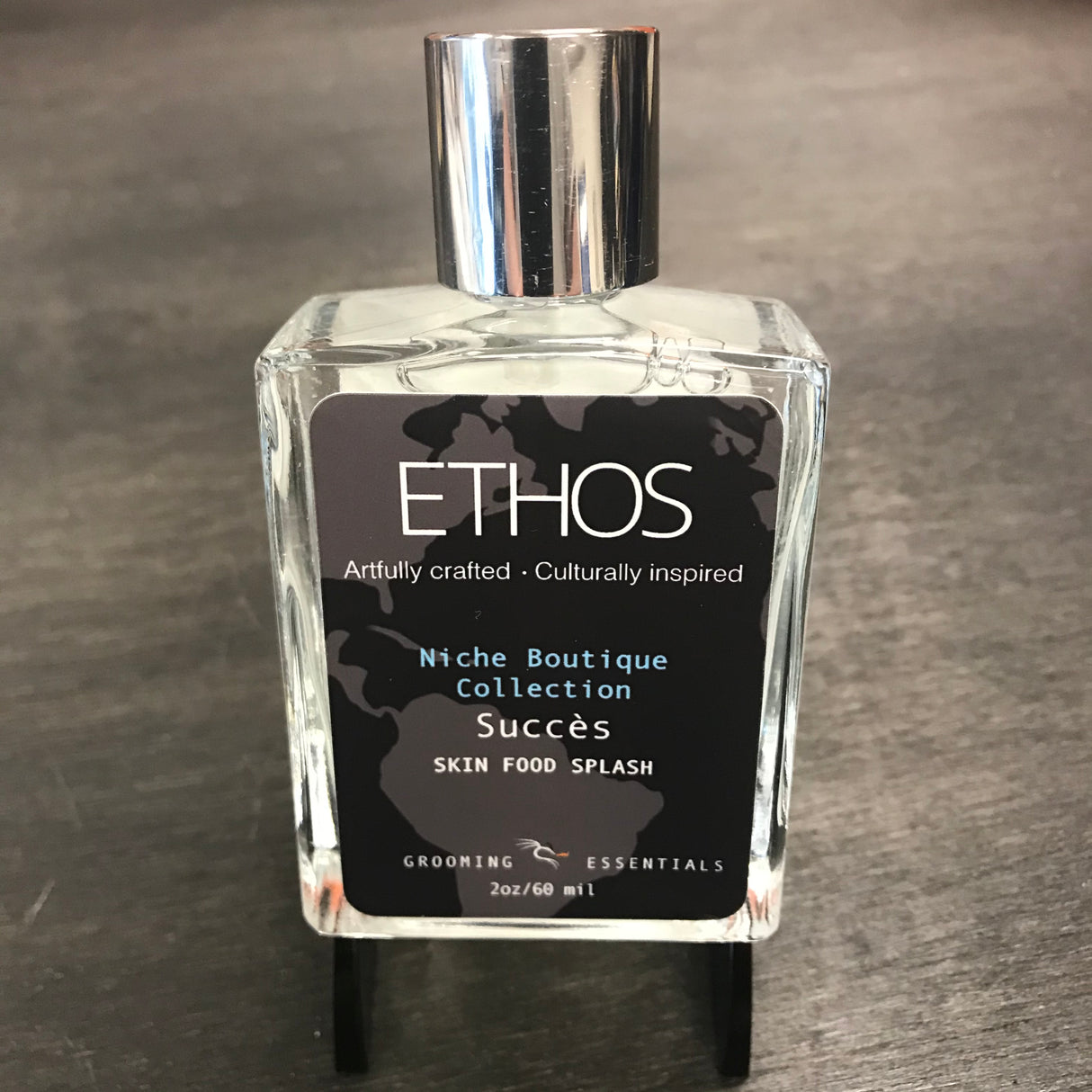 Ethos Grooming Essentials - Skin Food Splash - Success  Succès Skin Food Aftershave Splash aroma is a scent I call Pineapple Noir which is clean sofisticated colonge scent that opens with a prominent Pineapple top note that eventually drys down to nice smooth, somewhat smokey scent with the Pineapple note still present.