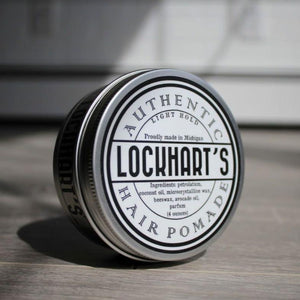 Lockhart's Light Hold Pomade  PERFORMANCE: HOLD: Light SHINE: High shine SCENT: Cinnamon/Clove     Lockhart's Light Hold adds a brilliant shine and works perfectly for slick backs, gentleman parts, and as a topper to add shine to heavier holds. The scent of this pomade is a special masculine blend of Clove, and Cinnamon.  4 ounces   Ingredients: petrolatum, coconut oil, microcrystalline wax, beeswax, avocado oil, parfum