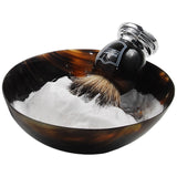 Parker Safety Razor's Shaving Soap Bowl is hand made from Genuine Mango Wood. This particular model has a deep and rich "redwood" color. Mango wood is a renewable resource as it comes from the same tree that bears the popular fruit. It can take a beating and retain it's beauty.