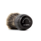 From Razorock:  The RazoRock 24 Barrel finest is a brush we are very excited about, a handle that took us much time to execute properly. Although the barrel seems like a simple design, it's proportions are critical to achieve both aesthetic beauty and great feel. The brush is very comfortable in the hand and great for face lathering because your thumb, pointer and middle fingers get close to the base of the knot when held, similar to how most master barbers hold a traditional shaving brush. 