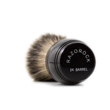 The RazoRock 24 Barrel Silvertip is a brush we are very excited about, a handle that took us much time to execute properly. Although the barrel seems like a simple design, it's proportions are critical to achieve both aesthetic beauty and great feel. The brush is very comfortable in the hand and great for face lathering because your thumb, pointer and middle fingers get close to the base of the knot when held, similar to how traditional shaving brush.with a densely packed 24 mm silvertip badger knot.