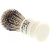  The Simpson Wee Scot Best Badger Shaving Brush is wonderfully functional compact brush. It is the smallest brush in production and is crafted with all of the expertise of Simpsons' other brushes. The miniature knot is handpacked into an off-white handle with the Simpson signature.     Manufacturer: Simpsons Total Height: 70mm Handle Height: 30mm Bristle Knot: 19mm Brush Type: Best Badger Handle Material: Synthetic Resin Country of Origin: United Kingdom